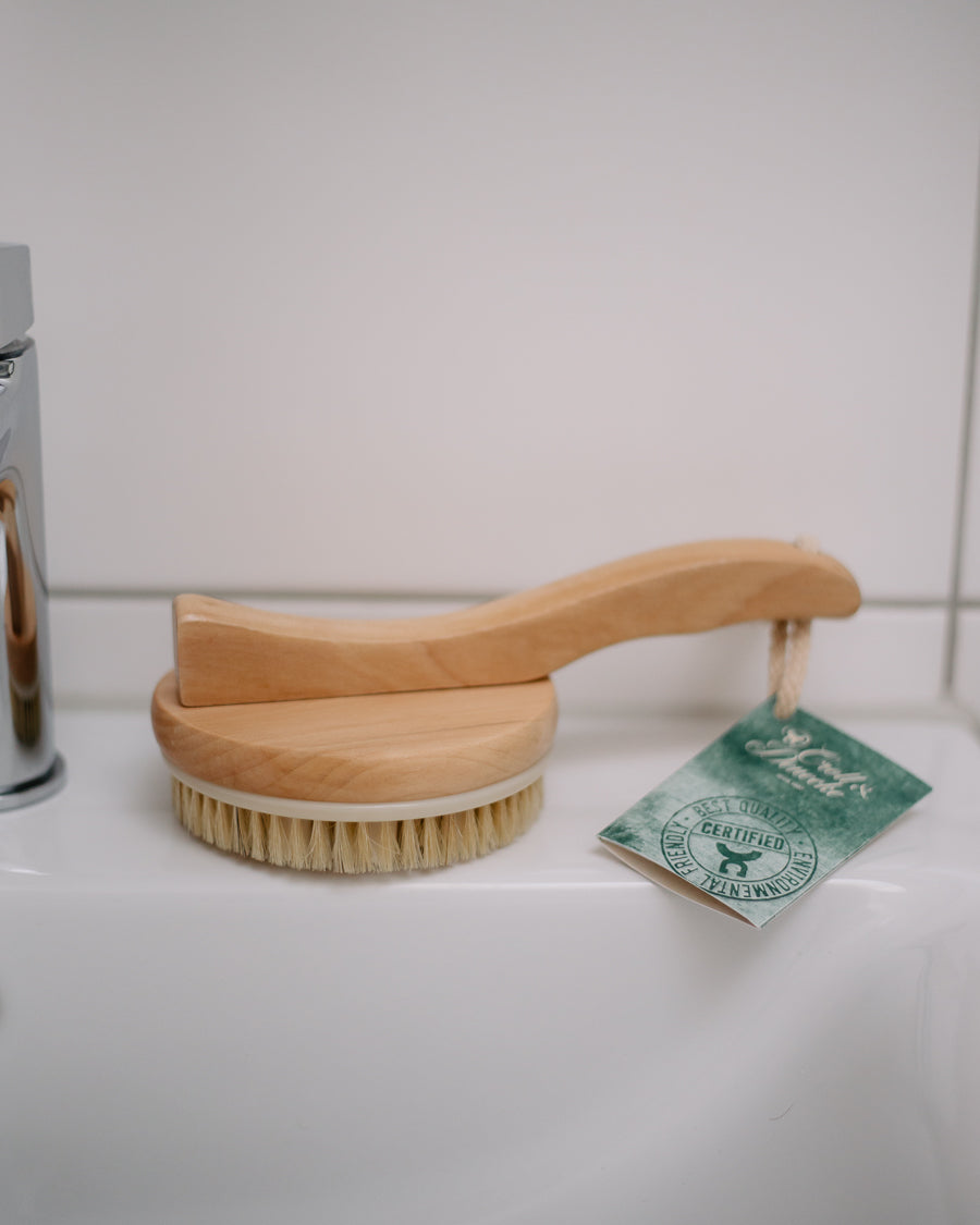 Massage brush with handle